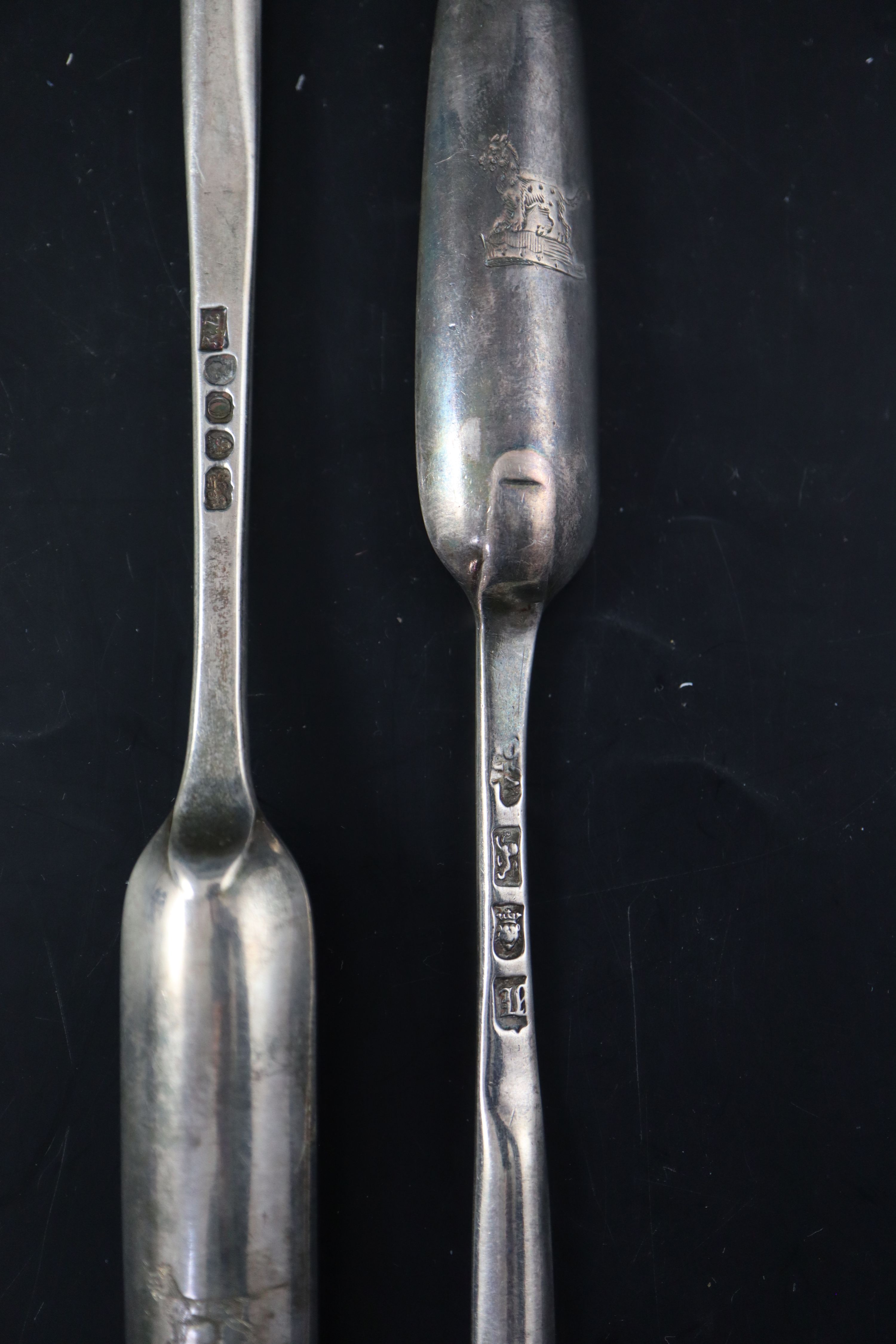 A George III silver marrow scoop and a later marrow scoop